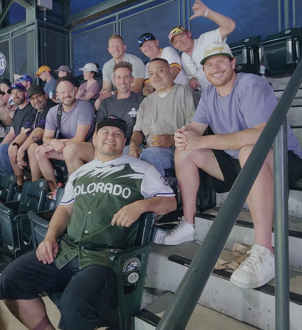 Summit men together at a Colorado Rockies game at Coors Field