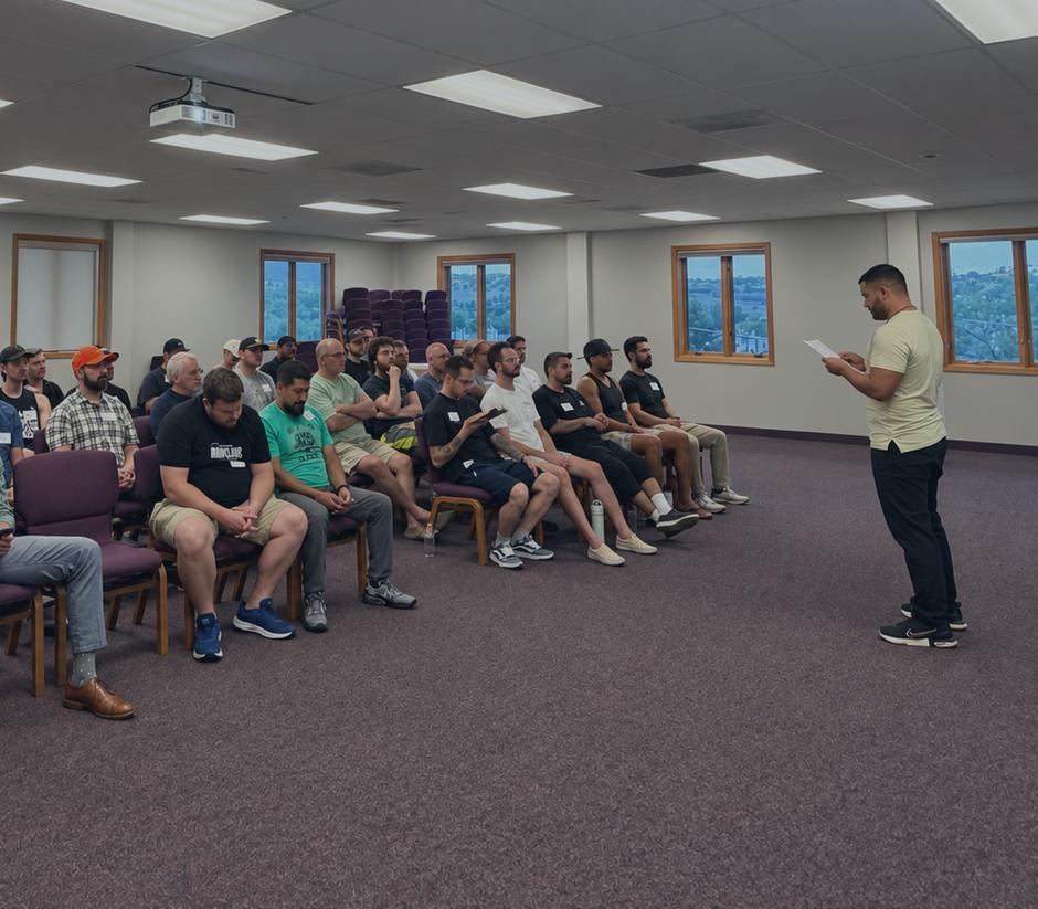 A Summit men&rsquo;s night: one man teaching to a room of seated men